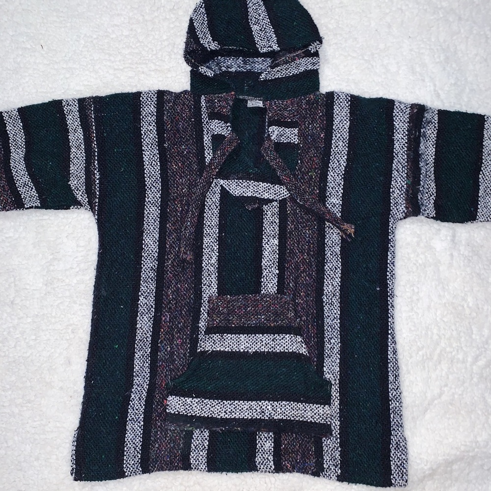 hooded “drug rug” sweater